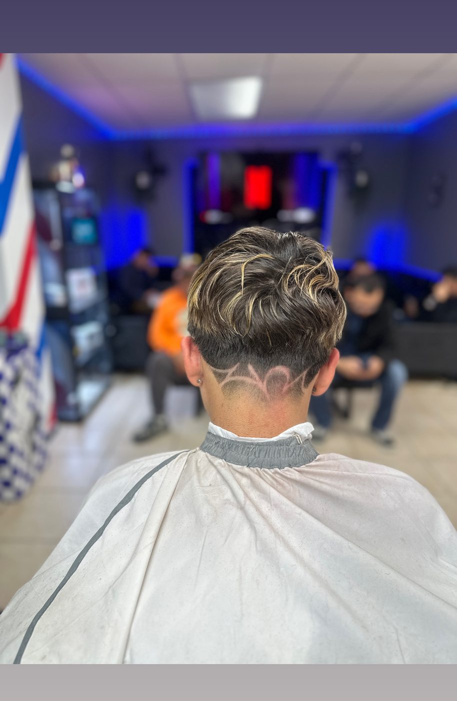 Custom hair design on textured fade