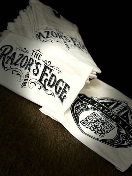 The Razor's Edge T-shirts with the shop logo and QR code